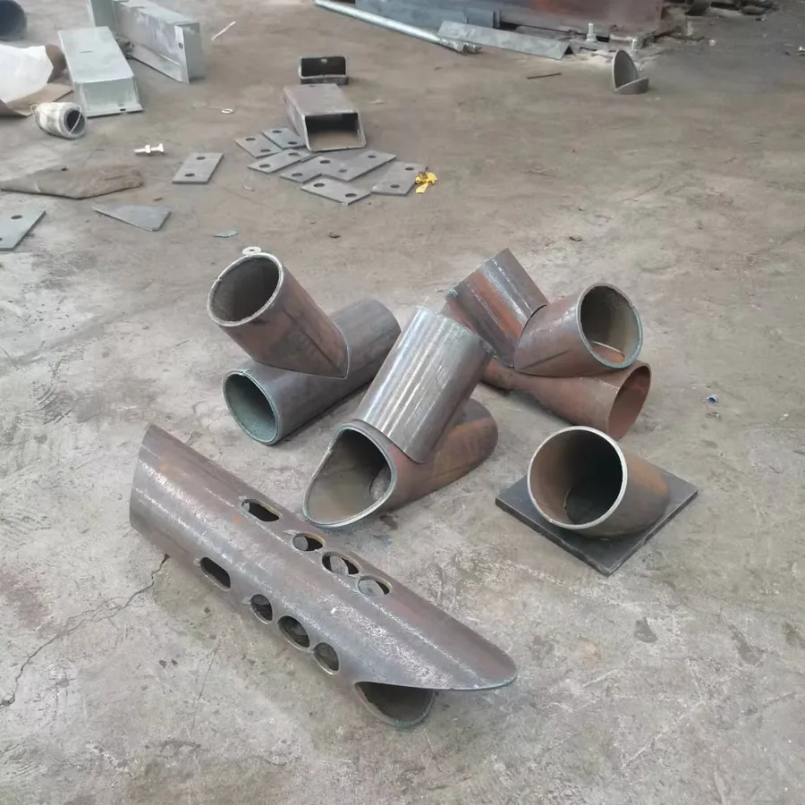 Pipe saddles, tees and branch holes cut by CNC plasma